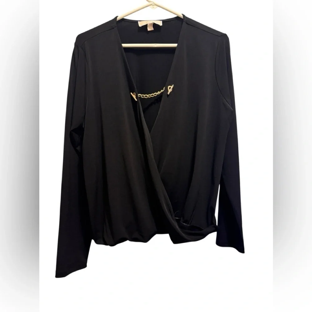 Michael Kors Black Top with Gold Detail is a stunning top for any occasions
